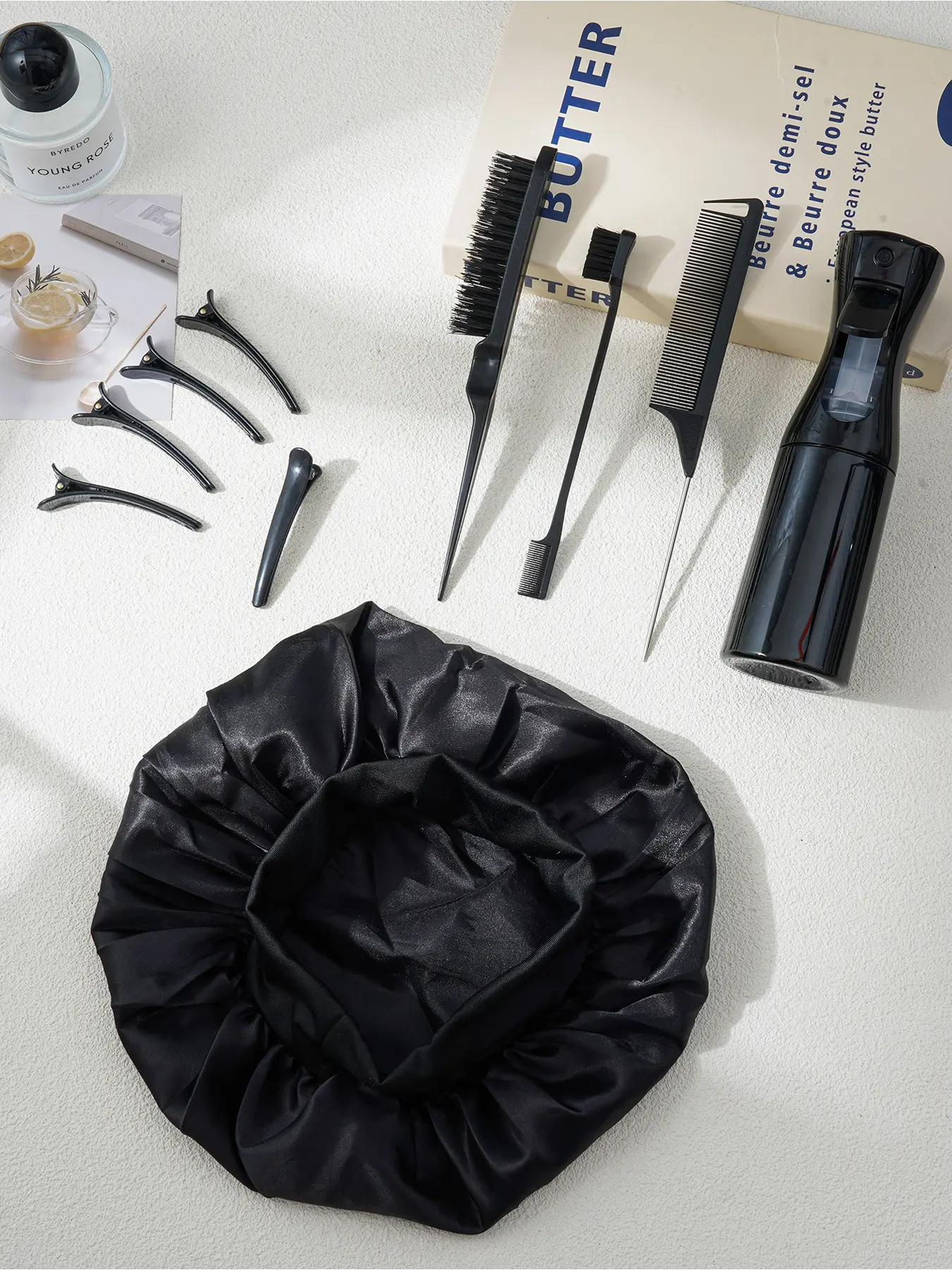 The 10 piece set of women's fashion styling tools includes a comfortable dry hair cap, durable straight hair comb, hair clipper, and multifunctional spray bottle, suitable for women's home styling
