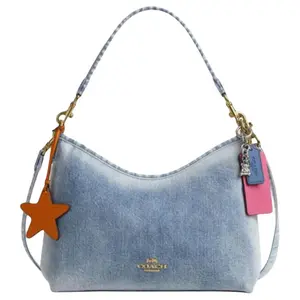 COACH Laurel Denim Charm Crossbody Bag for Women in Blue