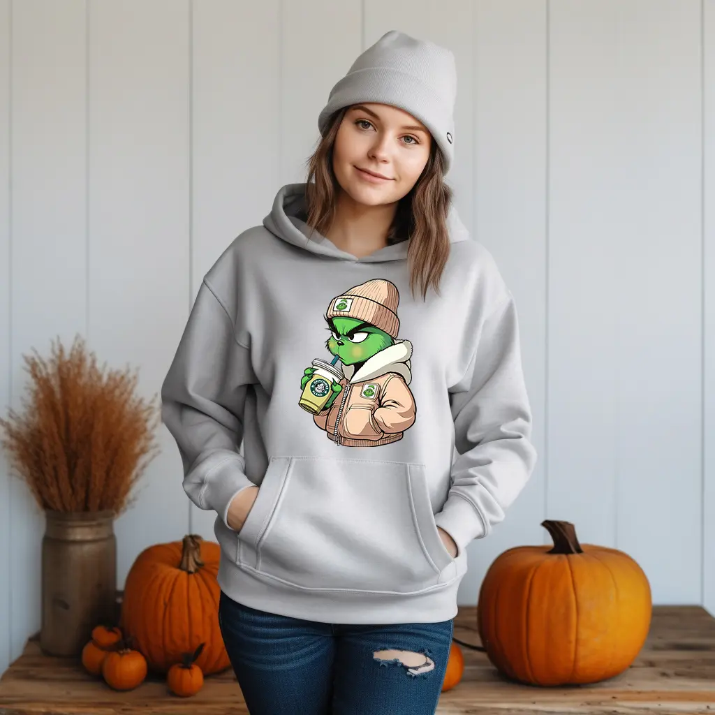 Celebrate Christmas with the Comfy Grinchy 2024 Coffee Hoodie