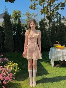 Daisy Kite Dress - 100% Cotton Embroidered with Playful Daisies Bow-tied Straps & Sweeping Skirt for Picnics & Barefoot Adventures