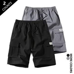 2026 Summer New Men’s Two-Piece Cargo Shorts Set, minimalist Japanese-style functional cargo look, drawstring elastic waistband, 3D large pockets, patch label decoration, available in multiple colors, suitable for young men for everyday commuting, outdoor