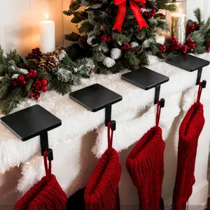Christmas Stocking Holders for Mantle Set of 4 Heavy-Duty Cast Iron Xmas Stocking Hangers Hooks with Protective Pad for Fireplace Home Shelf (Black)