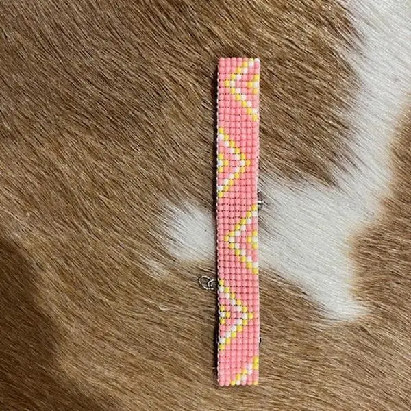 Beautiful Pink Peyote Bracelet with Yellow Zigzag Pattern on Fur Background