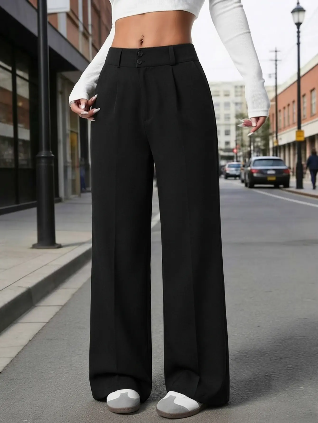 High-waisted women’s suit pants with two buttons and pleats, wide straight cut with a drapey floor-length feel; slimming, versatile for commuting and casual wear