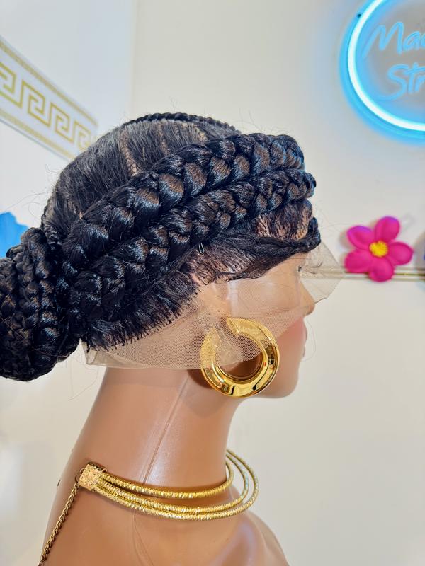 Hand braided jumbo cornrows.
