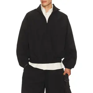 Fear of God ESSENTIALS Active Trace 1/2 Zip Track Jacket in Vintage Black