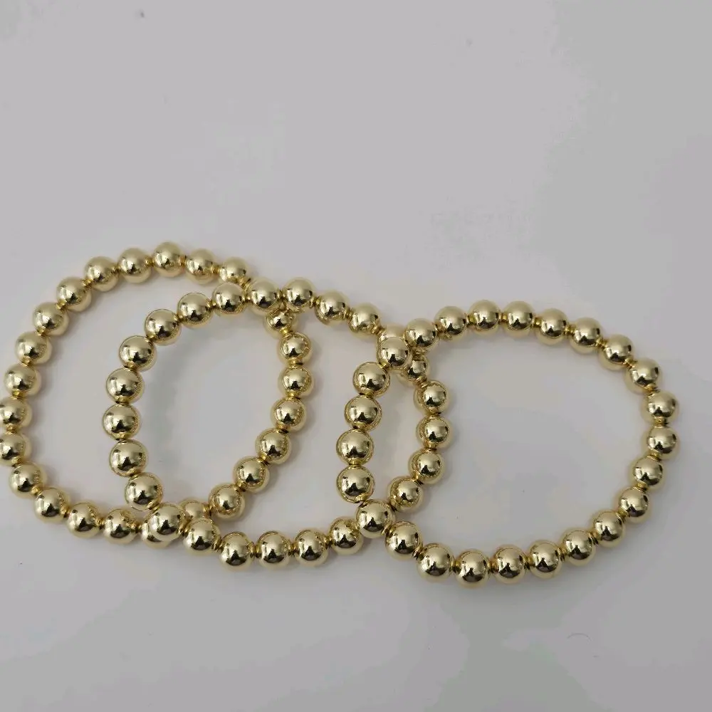 #195  18K Gold Plated Elastic Beaded Bracelet