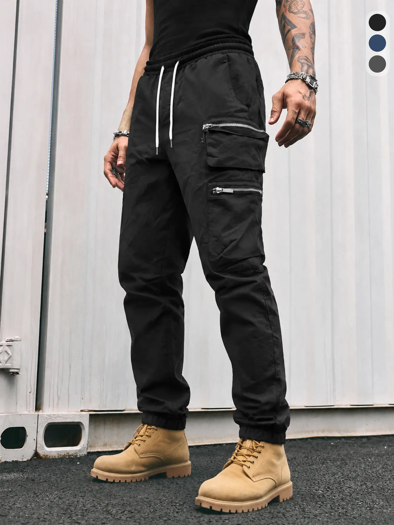 Black functional cargo jogger pants with high-street tactical style and zippered pockets; suitable for Gen Z streetwear; quick-dry outdoor functional design; versatile for daily commuting and two ways to wear; trendy festival style; high-street functional