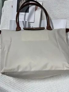 2026 Women's Large-Capacity Nylon Waterproof "Dumpling" Travel Bag with Leather Trim  Shoulder & Crossbody Style
