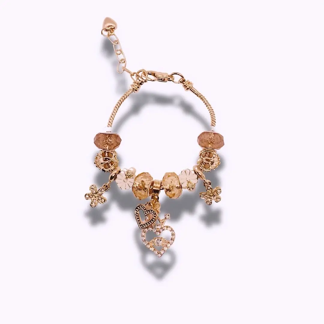 “Golden hearts” charm bracelet