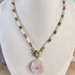 handmade natural stone snail necklace