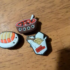 Toy Story Mystery Croc Charm Game Featuring Buzz Lightyear Woody and Alien Characters