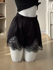 Women Black Satin Lace Trim Shorts High Waist Elastic Waist Flowy Mini Shorts Silky Loose Fit Feminine Soft Glam Lounge Bottom Elegant Casual Going Out Lightweight Chic Summer Short Bottom Romantic Lace Hem Shorts