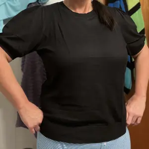 OFEEFAN Women's Puff Short Sleeve 2025 Spring Summer Sweater - Lightweight Knit Top - Business Casual Blouse, Soft & Breathable for Layering SpringStatements