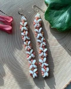 Hand crafted plumeria Puka with Kahe