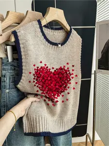 One spring/summer back-to-school knit top: loose fit, round neck, sleeveless. Features dark blue trim, color-block design, and heart-shaped prints for a Valentine's vibe. Wear solo or pair with a vest, ideal for casual outings or school.