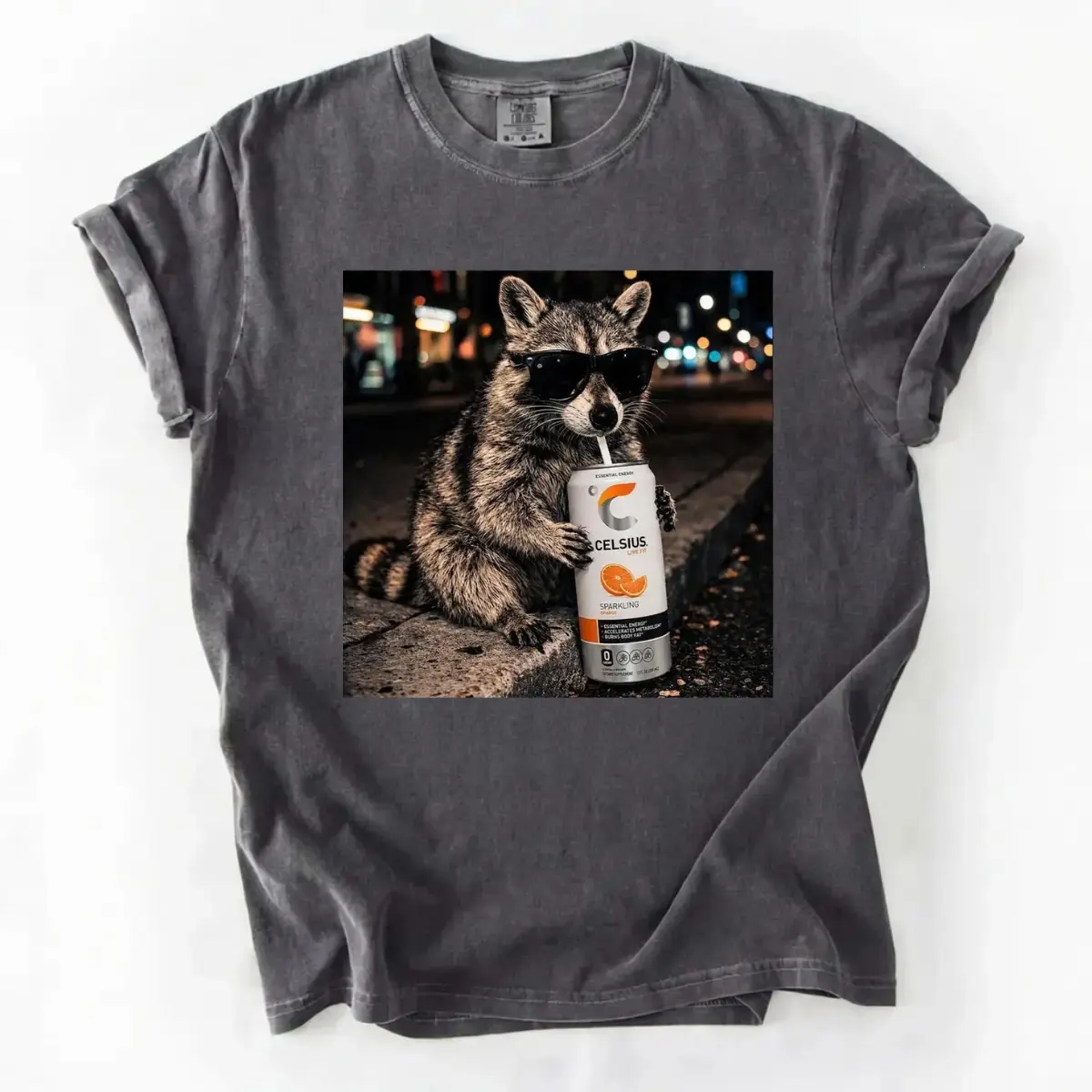 [Sale Up To 50%] Comfort Colors Cool Raccoon Drinks Celsius Orange Flavor Graphic Unisex Tee, Funny Soda Lovers Shirt, Vintage Raccoon Meme Gifts, Cartoon Style