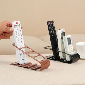 Korean-style creative four-compartment remote control storage rack for living room coffee table, plastic desktop organizer, remote control storage box