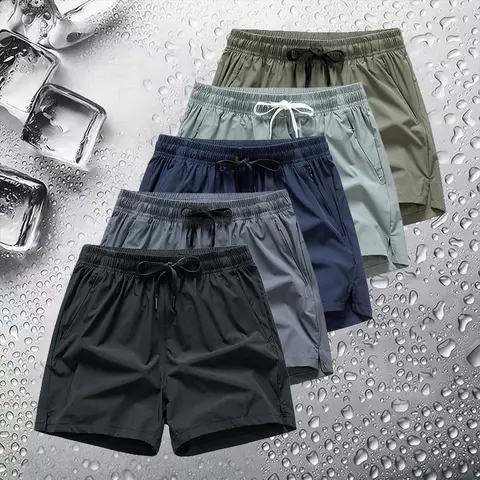 Men’s design featuring zippered pockets, a regular fit, and a drawstring waist—sporty style, suitable for summer outdoor wear, ideal for everyday activities and vacations, also appropriate for all seasons. Men's solid-color stretch shorts