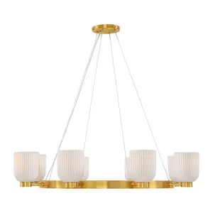 Isla Blanca 8-Light Chandelier in Warm Brass by Breegan Jane