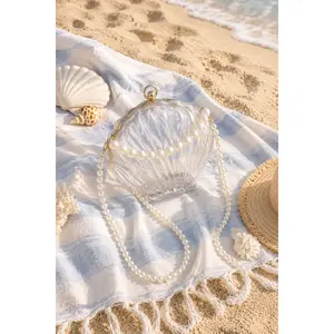 The Adriata Palace Pearl Seashell Clutch