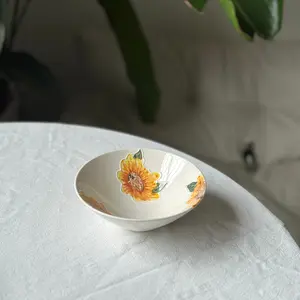 Handmade pottery bowl with yellow orange sunflower. Flower ceramic tableware. Birthday, wedding, festival gift.