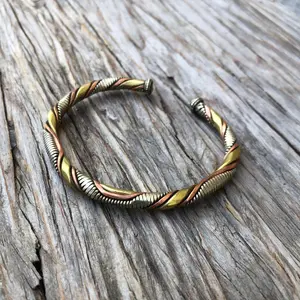 Braided Three Metal Bracelet - Elegant Design with Metallic Finish, Perfect for Everyday Wear