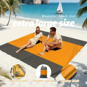 A Sand-Proof Beach Mat That Is Foldable, Equipped with Four Corner Stakes, Suitable for Outdoor Camping, Travel, Vacation, And Hiking. Made of Polyester, It Is Oversized, Lightweight, And Perfect for Picnics on The Beach