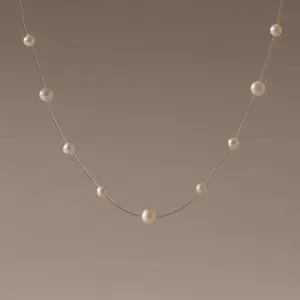 Floating Pearl Necklace by Caitlyn Minimalist - Dainty Pearl Station Necklace in 18K Gold Finish - Bridal Jewelry - Bridesmaid Gift for Her