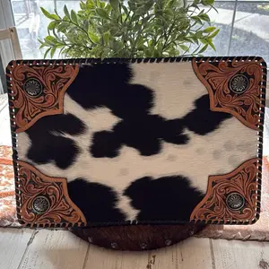 Cowhide Tooled Leather Placematst with Intricate Design and Durable Material for Tabletop Use