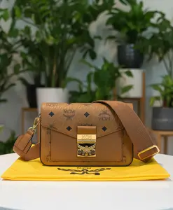Pre-owned MCM canvas and leather Crossbody Bags Cognac Tracy Crossbody New