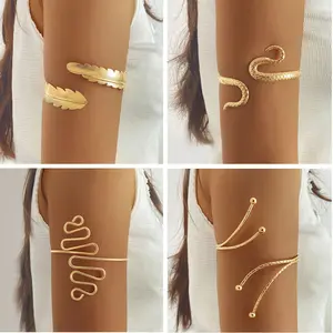 Metallic floral snake-shaped open arm bracelet with vintage geometric lines