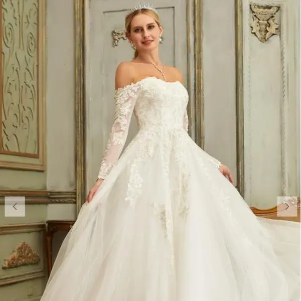 jjshouse wedding dress JJ's House A-line V-Neck Asymmetrical Tulle 2026 With Cascading Ruffles Pleated this wedding gown is here to take your beach bridal statement to the next level Wedding Gown Jjshouse Novias Wedding