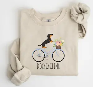 Retro Graphic Doxycycline Pharmacy Pun Sweatshirt, Dachshund on Bicycle Sweater for Pharmacists, Veterinary Tech Gift, Dog Lover