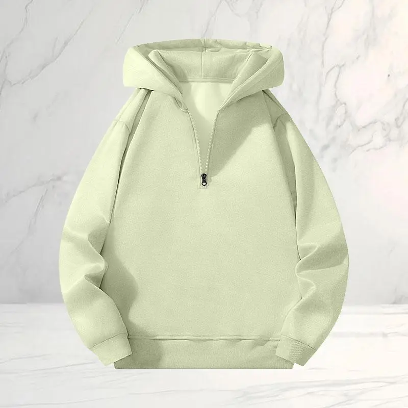 Unisex half-zip hooded sweatshirt in a relaxed American casual style, made from soft, skin-friendly, breathable fabric. Half-zip design for easy wear, hood provides windproof warmth, loose fit suitable for all body types, resists deformation and pilling.