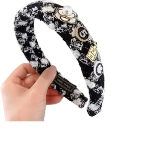 Luxury Knotted Headband with Designer Elements - Perfect for Stylish Looks Featuring Pearl and Gold Accents