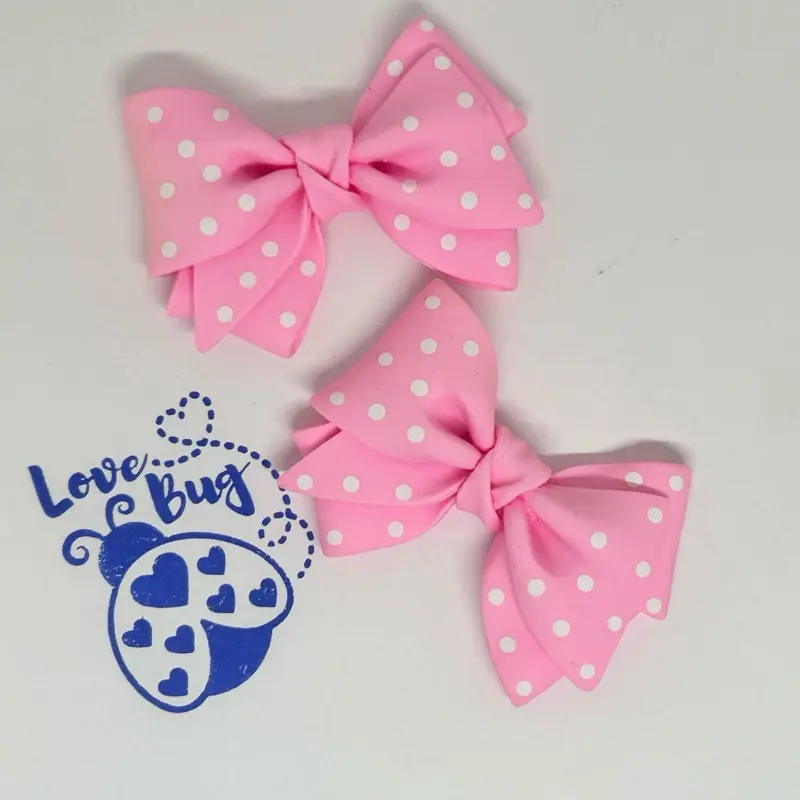 2inx2.5in clay flat back bows. Perfect embellishment for any badge reel, flat back beads or just the perfect decoration on for any DIY project you have.