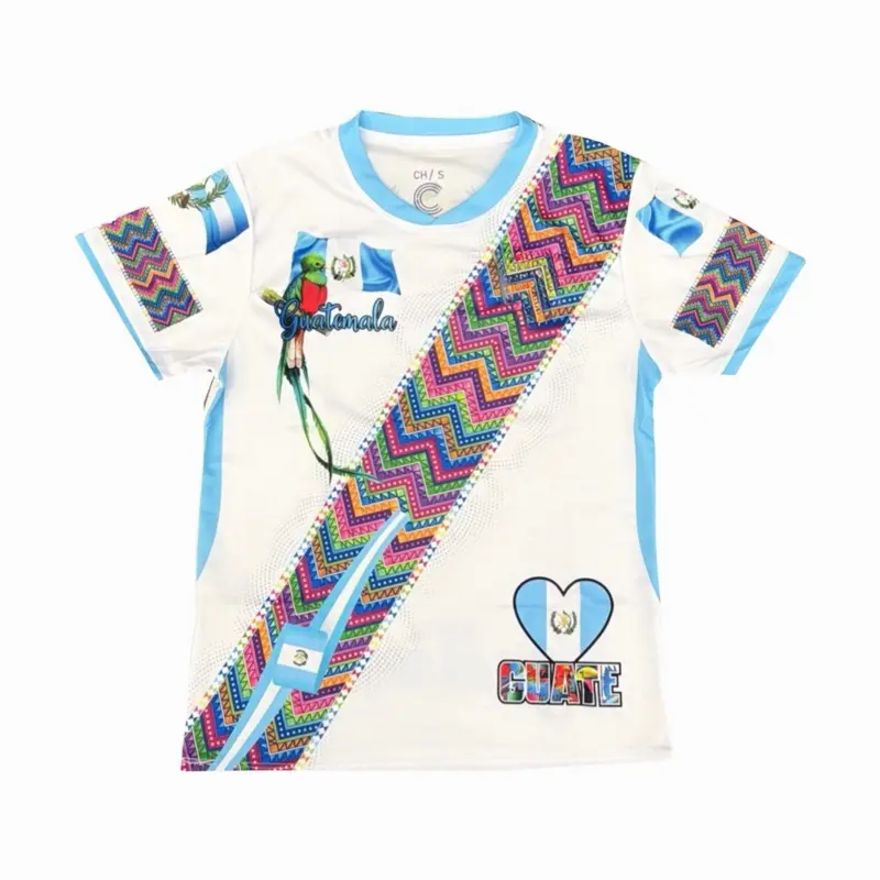 White Guatemala Típica Jersey with Traditional Colors Vibrant Design and Heart Motif for Cultural Pride.