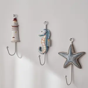 A Set of Three Mediterranean-Style Hooks, Made of Iron, Serves As Both a Coat Hook And a Strong Wall Decoration. It Combines Wood And Iron, Making It Sturdy Yet Visually Appealing, Utility Hooks