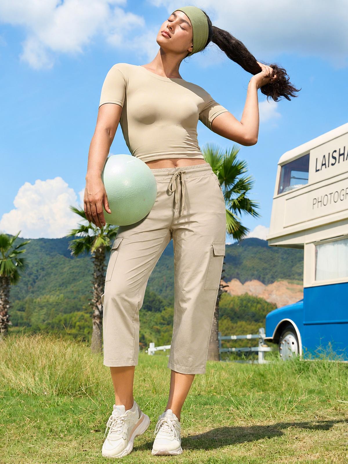JOJOANS Women's Quick Dry Cargo Capri Pants with 7 Pockets, Lightweight Breathable Mid Rise Drawstring Hiking Travel Pants, Stretch Outdoor Casual Capris for Vacation, Camping, Walking, Beach, Everyday Summer Outfit