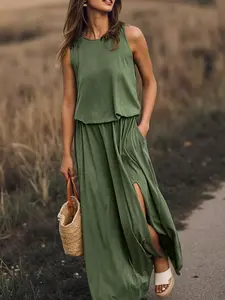 A set of women's casual dark green sleeveless dresses, with a waist cinched and slit to show off a slim mid length skirt, suitable for all seasons, suitable for home, indoor, and outdoor wear