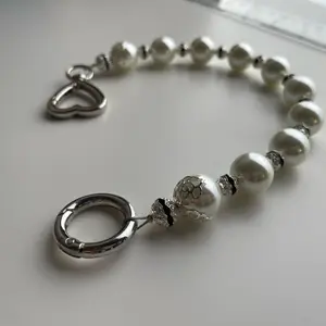 Artificial pearl bag extension strap