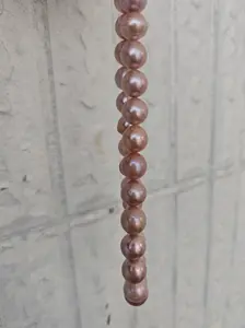 Natural freshwater pearl flat beads10-12mm, oval-shaped, purple color. Necklace and bracelet semi-finished products. Handmade DIY.