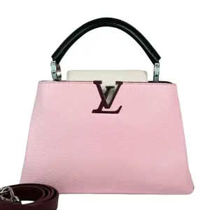 Pre-owned Louis Vuitton Leather Shoulder Bags Pink MM Capucines Shoulder Bag with Sleek Design Functional Features Classic LV Logo Adjustable Strap