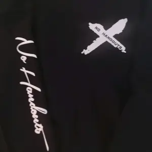 Libra No. Hamdouts Sweatshirt - Black Pullover with White Design and "NO HANDOUTS" Text