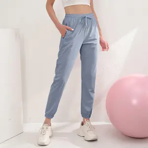 New women’s quick-dry jogger sweatpants with elastic waistband and zippered pockets, long pants for fitness and running