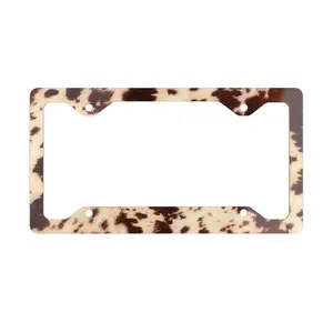 Western Cowhide Print License Plate Frame – Rustic Rodeo Style Car Tag Cover | #CowPrint #WesternStyle #LicensePlateFrame #CowgirlStyle #CountryGirl #RodeoStyle #WesternDecor #FarmhouseStyle #RusticStyle #CountryAesthetic #CowhidePrint #AutoDecor