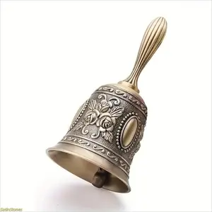 1-piece set of high-quality brass handbells. It features a classic traditional style, a crisp and clear sound, and is a portable handheld musical toy. It is an educational hand-cranked instrument suitable for children, adults, weddings, parties, classroom