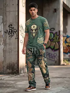 Olive green T-shirt paired with matching camouflage pants, featuring a gothic skull print and street graffiti slogans on the front—a must-have two-piece men's streetwear set
