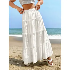 Women’s 1pc solid eyelet-punched tiered maxi skirt (coastal minimalist summer vibe style), lightweight breathable fabric, elastic smocked waist, flowy ruffled layers, subtle perforated dot detail design, flared skirt